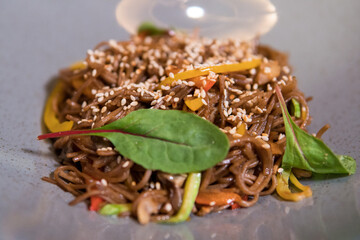Japanese buckwheat noodles fried with vegetables and shrimp