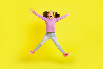 Full size photo of excited school child jump high moving scream isolated shine vibrant color background