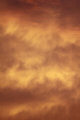 Fototapeta na wymiar burning clouds in the sky before sunset.