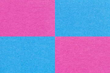 Fototapeta premium Texture of craft bright blue and purple paper background with cells pattern. Structure of vintage lilac cardboard.