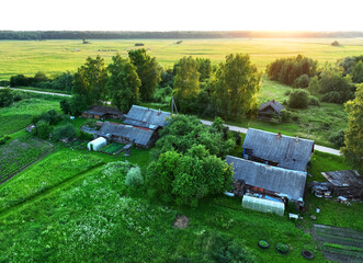 Village wooden house. Country houses in countryside, aerial view. Rural building and farmhouse in...
