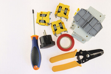 Composition of electro instruments for electricians on a white background.