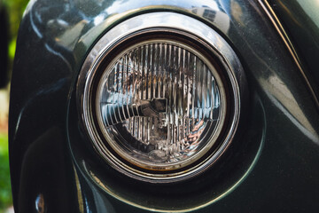 Classic old round headlight. Old timer car details
