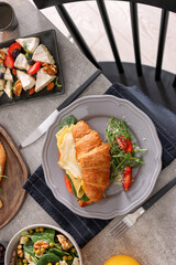 Many different dishes served on buffet table for brunch, flat lay