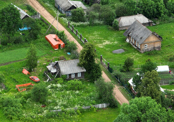 Village wooden house. Country houses in countryside, aerial view. Rural building and farmhouse in...