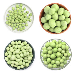 Set with spicy wasabi coated peanuts on white background, top view