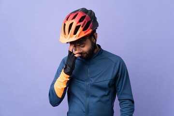 Young Moroccan cyclist man isolated on purple background laughing - obrazy, fototapety, plakaty