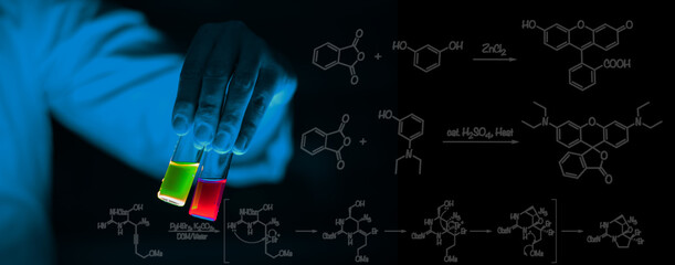 A woman scientist holding Organic chemistry sample glass vials in a laboratory - radioactive - fluorescence. A copy space black background.