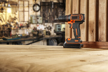 Screwdriver on table and worhop interior. Free space for your decoration. 