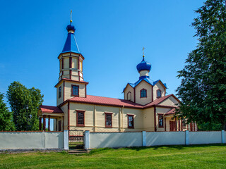 Fototapeta na wymiar General view and architectural details in a close-up of the temple, the Orthodox Church of St. James in the village of Łosinka in Podlasie, Poland, built in 1886.