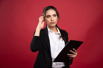 Young businesswoman thinking about next meeting