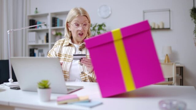 Surprised woman receiving a present, fast delivery, stop motion, ecommerce