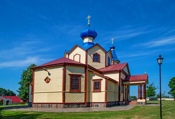 Fototapeta na wymiar General view and architectural details in a close-up of the temple, the Orthodox Church of St. James in the village of Łosinka in Podlasie, Poland, built in 1886.