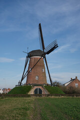 Fototapeta na wymiar Landscape with Windmill. Zeeland, the Netherlands.