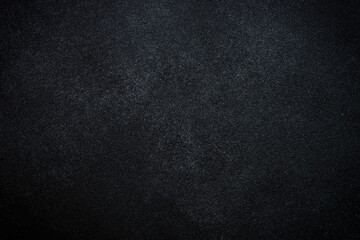 Black background. Black stone texture, free space for design.