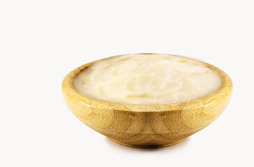 pork fat lard, pork fat used as a Brazilian culinary ingredient, bacon and sausage in the background