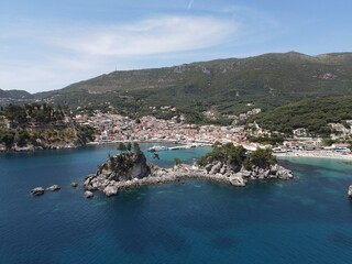 Fototapeta na wymiar Parga the greek caribbean in preveza, famous Traditional tropical destination vacation summer tourist attraction with the deep blue ocean of ionian sea greece