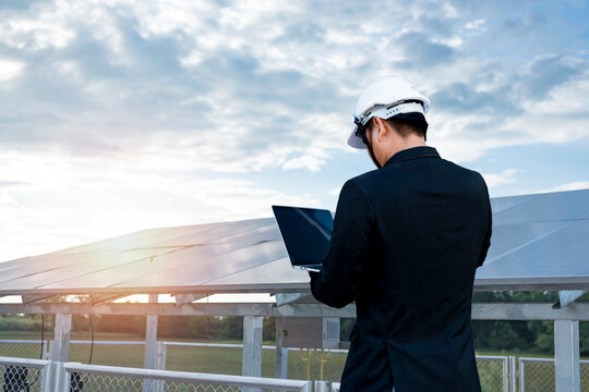 Logistician Managing Photovoltaics Supply Chain Via Laptop. Industry, Business And Technology Concept For Renewable Energy, Solar Module Manufacturing, Workflow Efficiency, Sustainability.