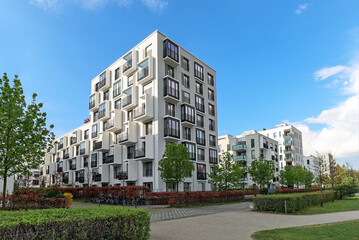 Cityscape of a residential area with modern apartment buildings, new green urban landscape in the city - 515867206