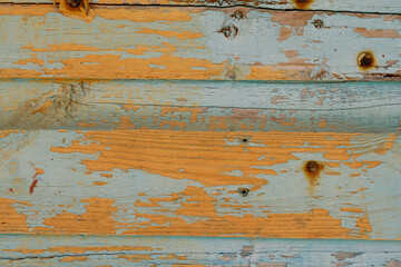 Old rustic wooden blue and orange texture - banner on wooden background.