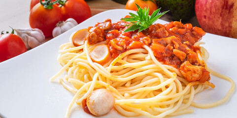 Close-up menu pasta spaghetti with meatballs and tomato on the table.Top view
