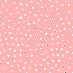 Pink seamless pattern with white tiny flowers.