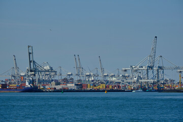 ROTTERDAM, THE NETHERLANDS - New container terminal with a very large container ship and in the...