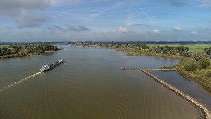 Aerial drone view of the beautiful view over the river in the Netherlands, Europe. Shot at De Lek river area in the Netherlands.