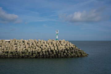 Dutch dike by the North Sea made of concrete stones, Netherlands