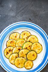 zucchini fried vegetables fresh healthy meal food snack diet on the table copy space food background rustic top view keto or paleo diet veggie vegan or vegetarian food