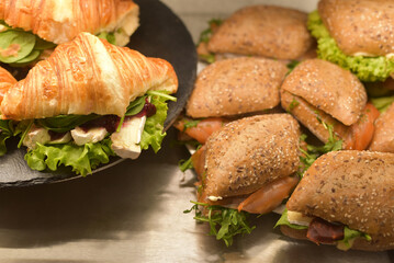 Appetizing croissants and sandwiches in a restaurant
