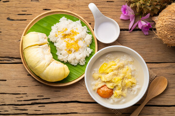 Thai sweet food,Cooked sticky rice in sweet coconut milk with Durian fruit in white bowl,popular...
