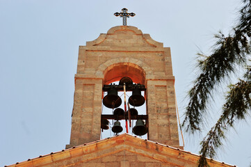 Bells on the roof of a church at Israel