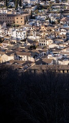 Obraz premium GRANADA, SPAIN - FEBRUARY 2022: View of the houses of the city of Granada