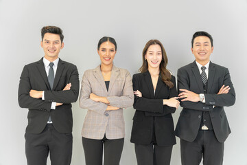 Asian businessman looking at the camera Working and meeting at the office at the company with colleagues at the back