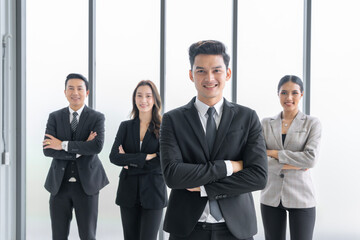 Asian businessman looking at the camera Working and meeting at the office at the company with...