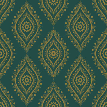 Ethnic Indian retro green-gold color flower shape seamless pattern background. Use for fabric, textile, interior decoration elements, upholstery, wrapping.