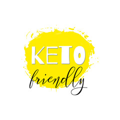 Keto friendly. Lettering on hand paint yellow watercolor texture isolated on white background. Ink dry brush stains, stroke, splash, smudge, scribble. Low carb high fat motivation quote menu poster. - 515885259