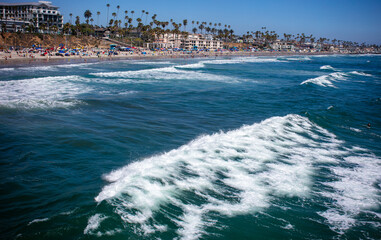 The Beach at Oceanside, California,  Crowded with People on Vacation enjoying the Shore