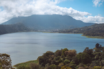 Naklejka premium Buyan Lake, Bali, Indonesia. Tropical nature, background.