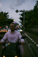 Young couple on a scooter in Bali.