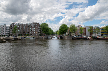 Fototapeta na wymiar View From The Jan Vinckbrug Bridge At Amsterdam The Netherlands 5-7-2022