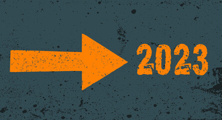 Grunge yellow arrow on gray texture pointing to 2023 next. Background 2023 New Year future vision concept. © Mystery