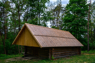 Fototapeta na wymiar Old wooden house in the forest.
