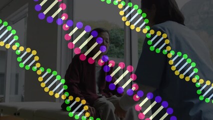 Animation of dna strands over asian female physiotherapist talking with patient - Powered by Adobe