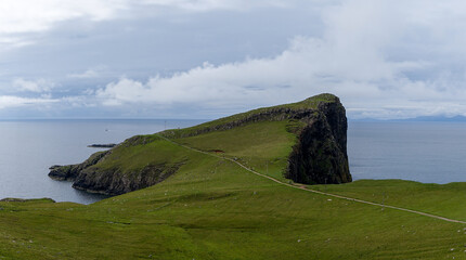 panorama landscape of the green cliffs on the coast of Neist Point on the Isle of Skye