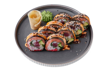 Rolls with salmon, tuna, avocado, rice, sauce, flying fish caviar, sesame seeds