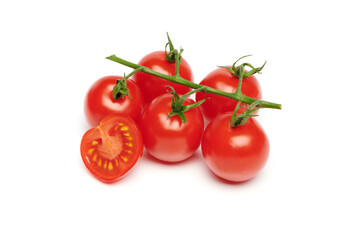 Bunches of fresh red cherry tomatoes isolated on white background. Ripe tomatoes on green stems. Fresh organic vitamin vegetables.