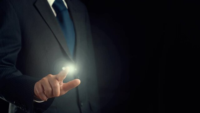 Businessman show hologram of programming coding allusive technology. Virtual augmented reality generated by 3D rendering motion graphic and animation to create futuristic HUD .