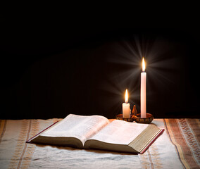 Still life from ancient book with candle